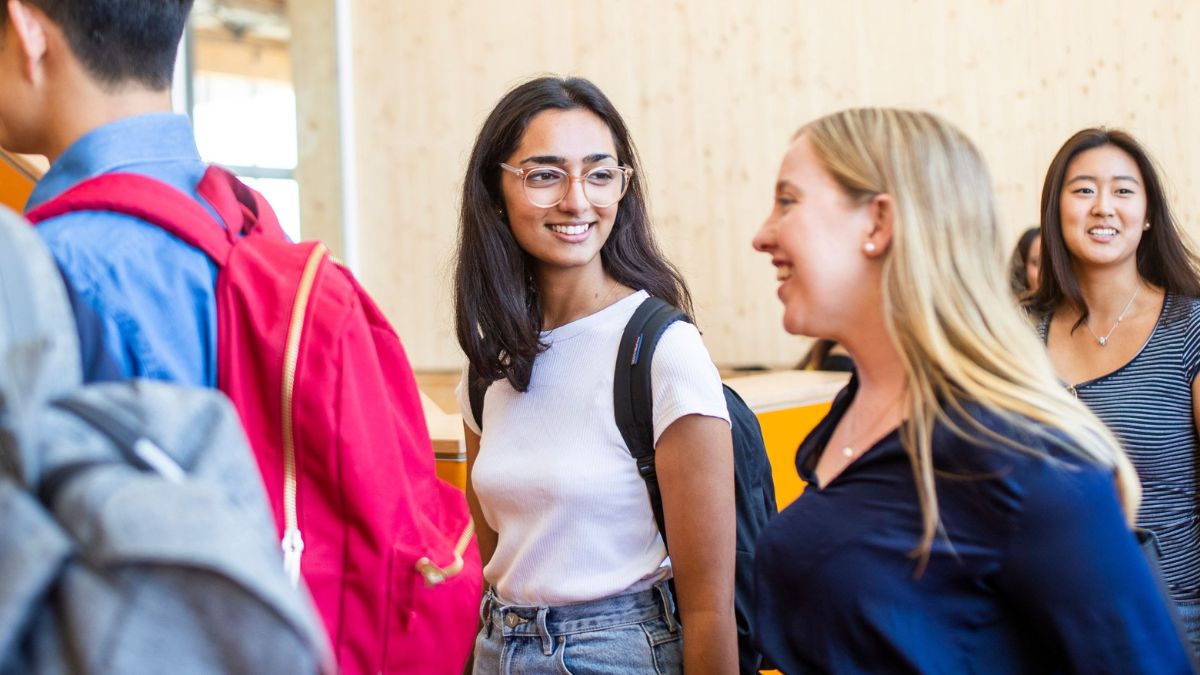 Students going up the stairs in the Marie Reay Teaching Centre at ANU.