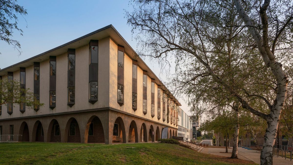 The exterior of Chifley Library at The Australian National University at sunset.